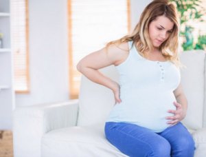 Боли в яичниках при беременности