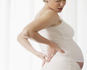 Болит поясница при беременности